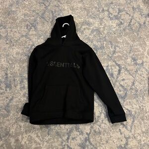 Essentials hoodie, size medium.